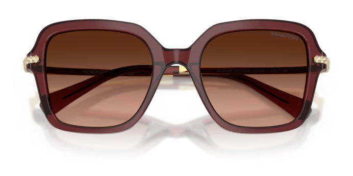 Lunettes de soleil Swarovski SK6040 10735M Bordeaux transparent - vue de face, branches repliées